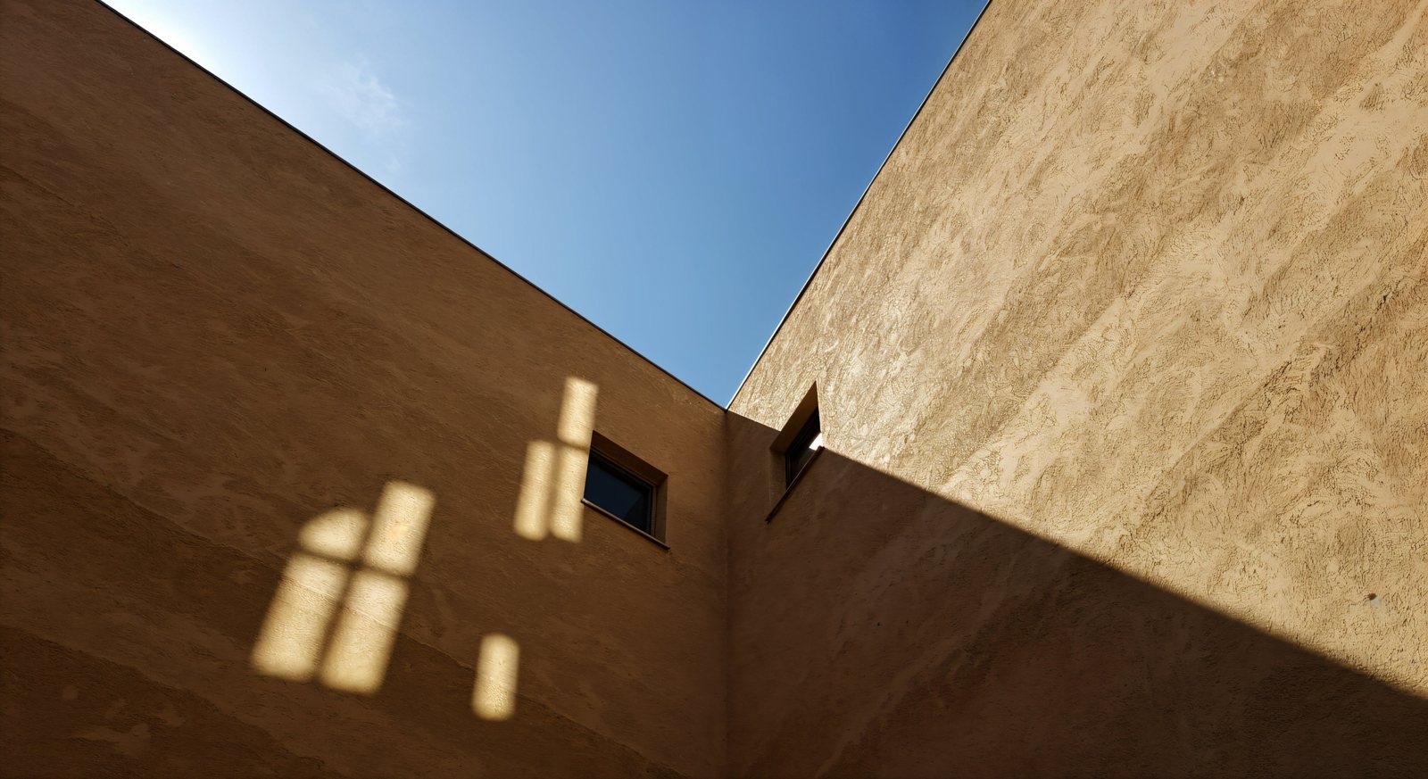 Sunlit contemporary architecture in Dubai, illustrating off-plan property investment.